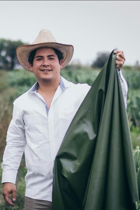Adrián and Marte - founders of Desserto - holding their alternative leather made from cactus
