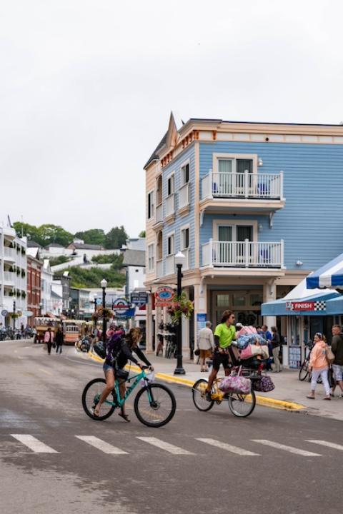 Bikers on Main Street in Mackinac Island, Michigan — bike infrastructure