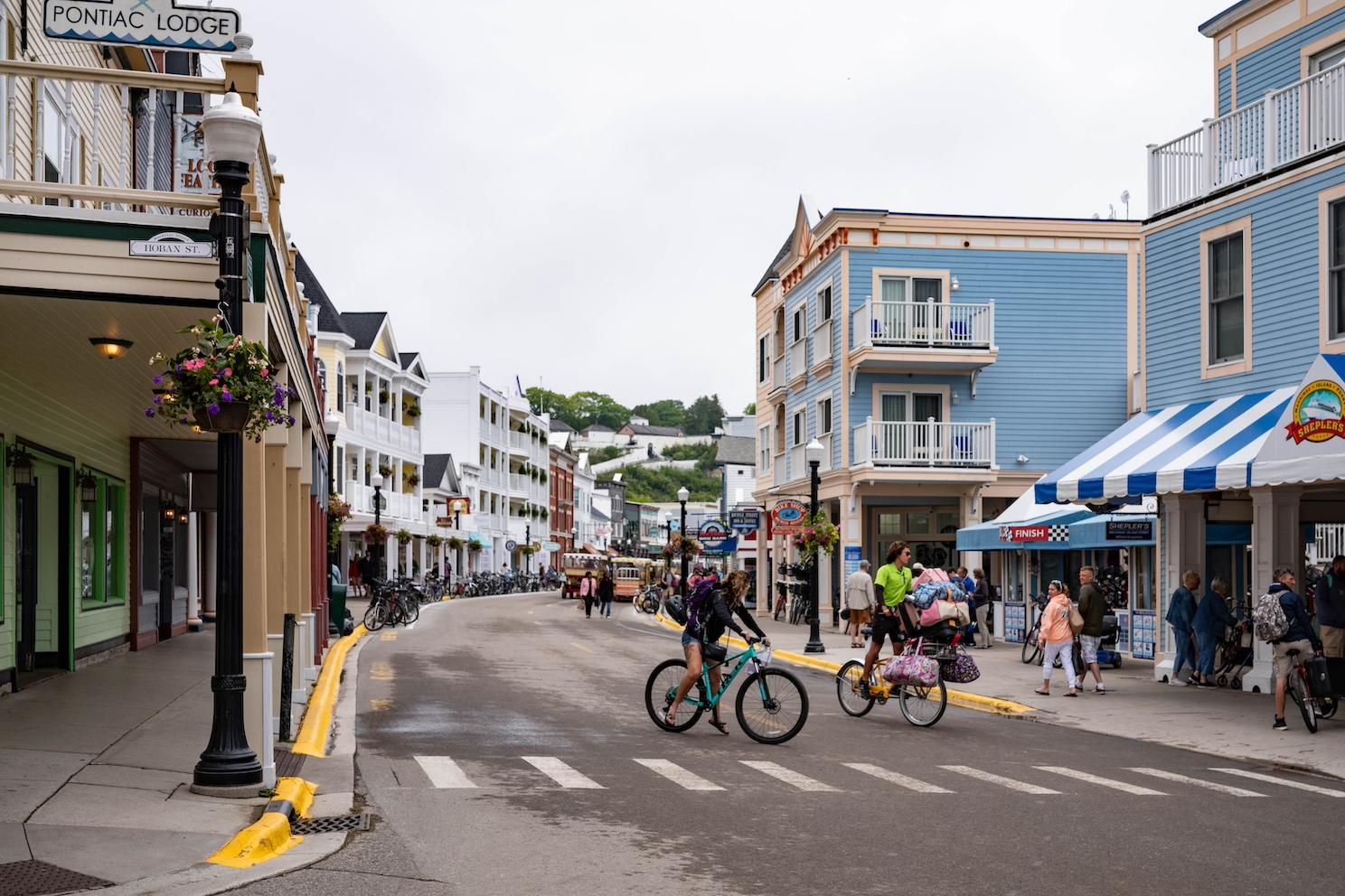 Bikers on Main Street in Mackinac Island, Michigan — bike infrastructure