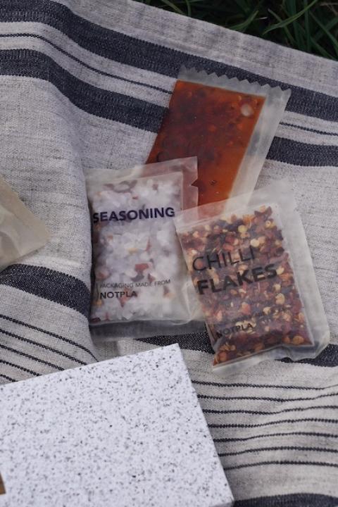 Notpla's thin-film plastic alternative sachets made from seaweed.