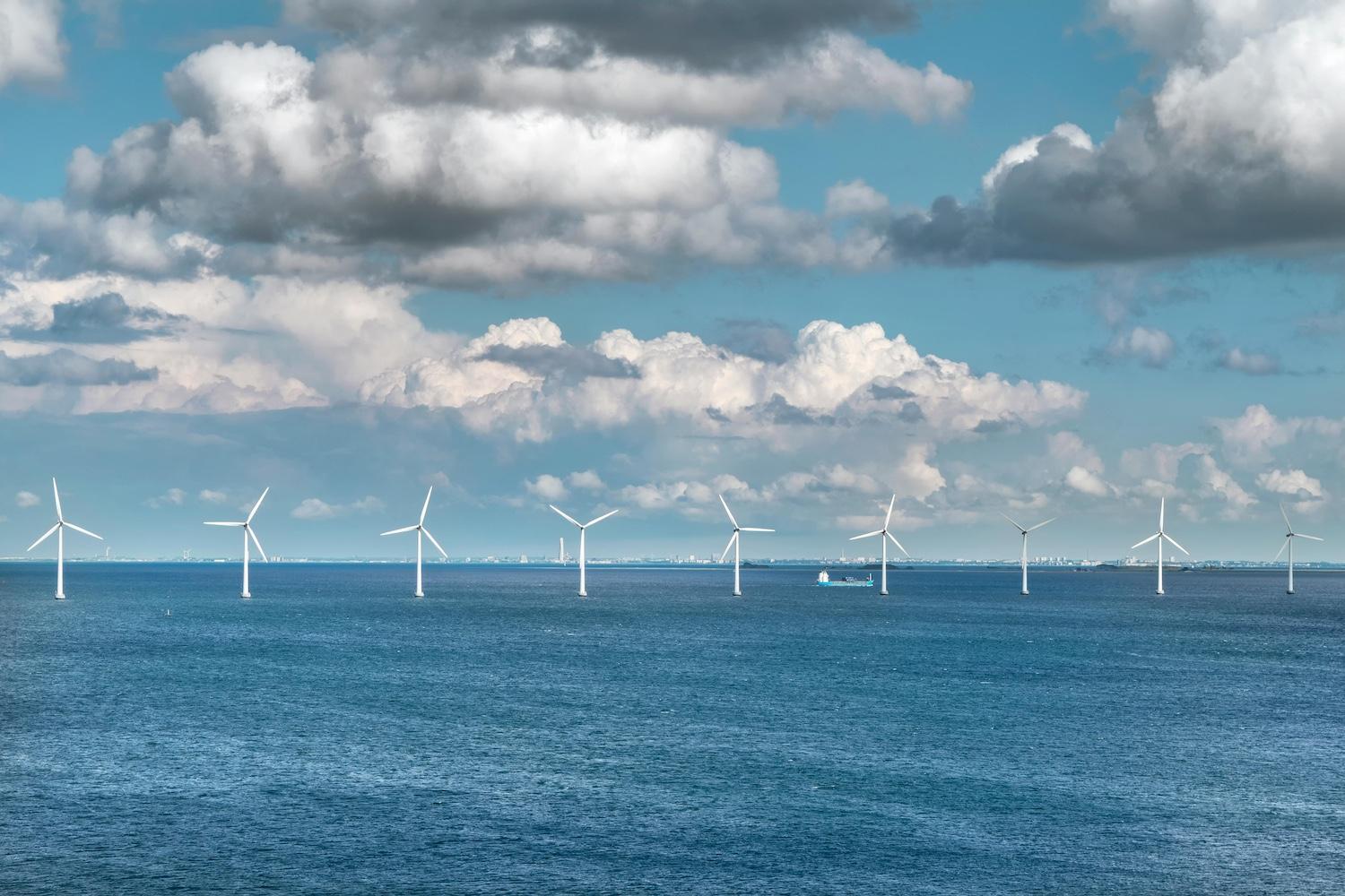 A line of offshore wind turbines.