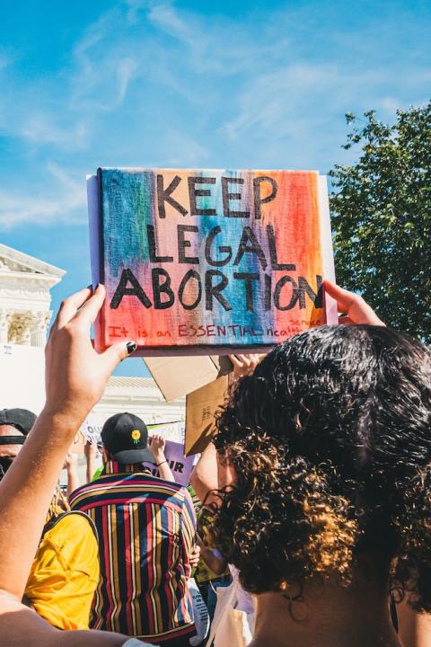 protest for reprodutive rights in washington dc - protester holds sign that reads keep legal abortion