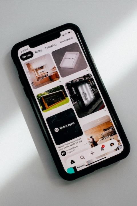 A phone displaying the Pinterest app — RECs