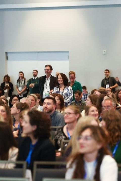 crowd watching greenwashing panel at Sustainable Brands conference 2024 