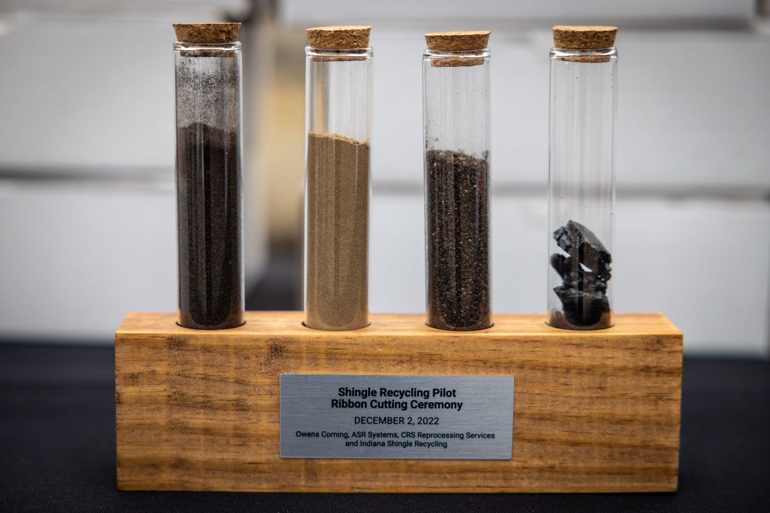 shingle recycling raw recovered material in test tubes