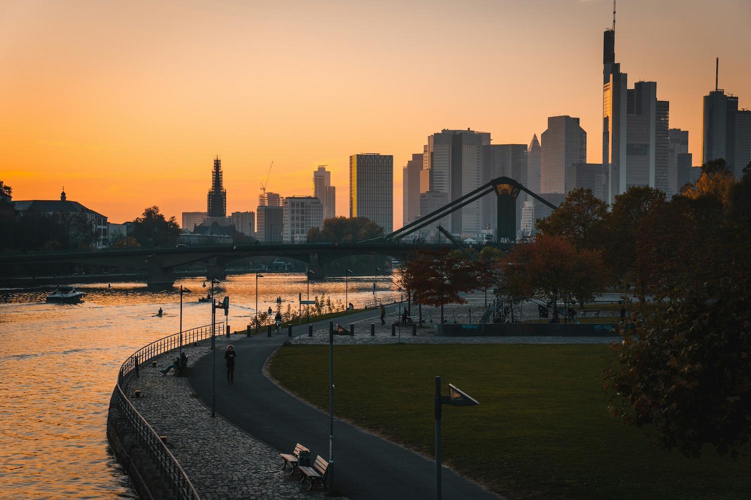 The skyline of Frankfurt, Germany, at sunset — solutions journalism