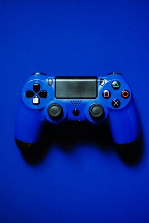 A video game console controller. 