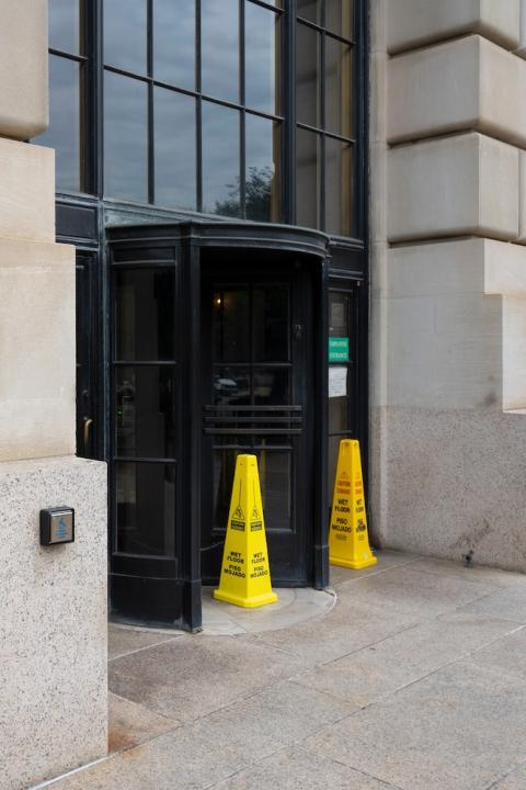 US Environmental Protection Agency headquarters with hazard cones outside — the future of climate programs under the federal funding freeze