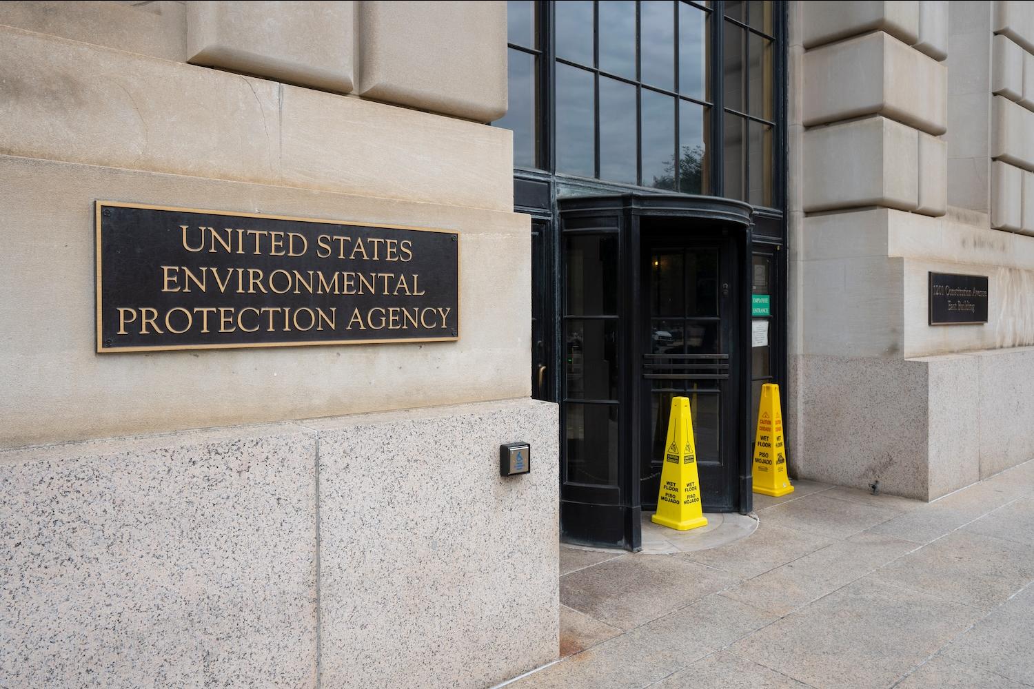 US Environmental Protection Agency headquarters with hazard cones outside — the future of climate programs under the federal funding freeze