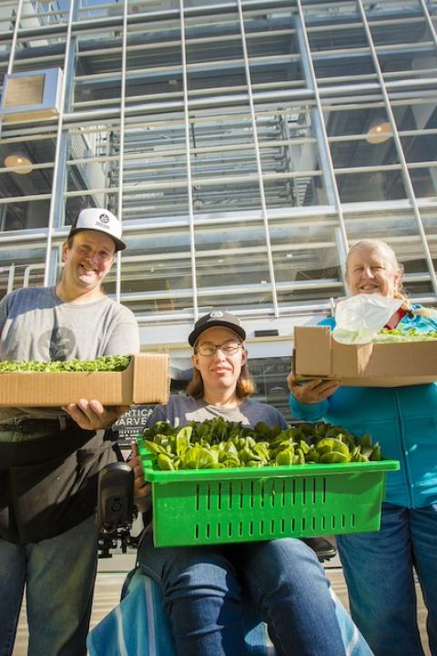 Employees outside of Vertical Harvest's greenhouse in Jackson Hole, Wyoming. 