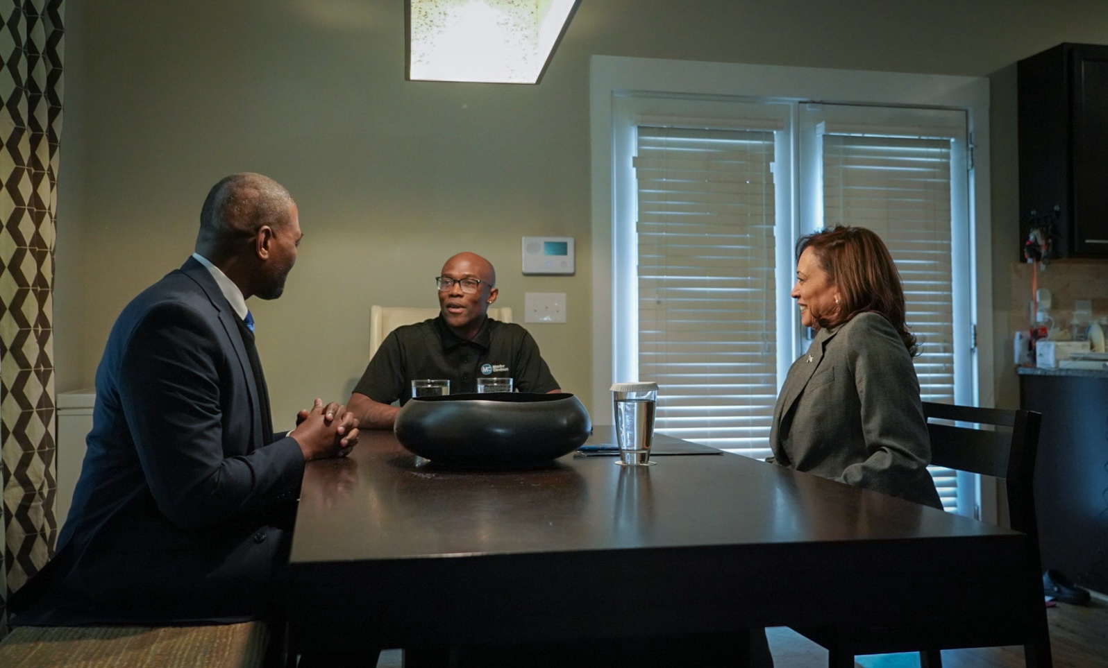 vice president kamala harris and epa administrator michael regan visit a local in charlotte whose home was retrofitted by a local nonprofit