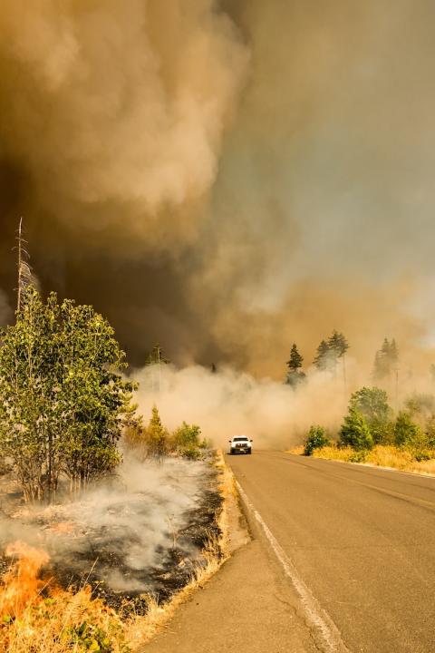 truck driving through wildfires