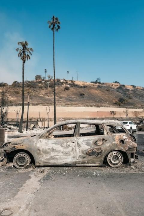 wreckage left after California wildfires — palisades fire — climate change — climate risk