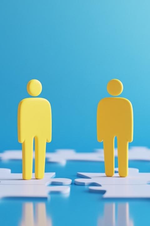 yellow figures on puzzle pieces illustration — represents CEO business leadership