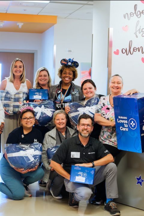 employees deliever care packages from sport subaru copy