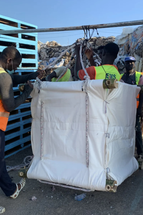 A group of people put together a square-shaped jelly-FAD — fish aggregating devices